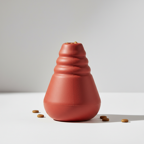 Durable red rubber Kong-style treat dispensing chew toy for dogs