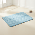 Soft blue gel cooling mat for dogs laid flat